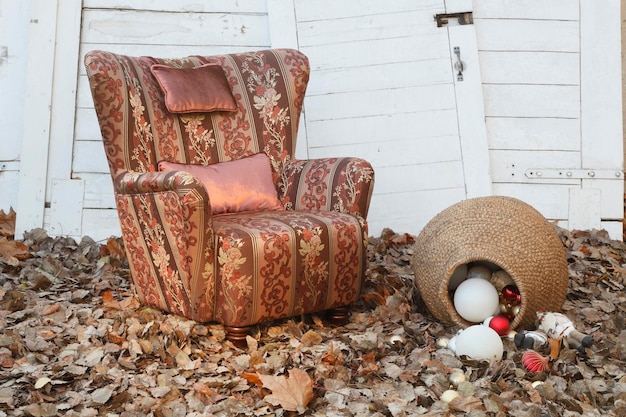 Before-and-after photo showing a revamped old armchair with a new SHEIN fabric cover and decorative pillows.