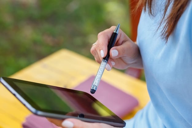 A close-up shot of a student using a stylus on a tablet to take notes during a lecture. The screen displays a detailed diagram and handwritten annotations, highlighting the tablet's usefulness in visual learning and note-taking.