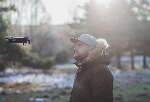 A close-up shot of a drone's camera gimbal, illustrating its ability to stabilize the camera during flight. The background is blurred, focusing on the gimbal's intricate mechanics.